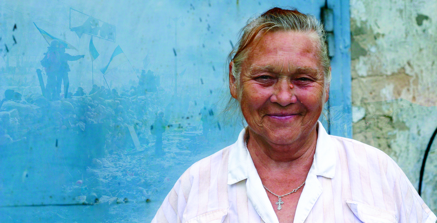 Cropped-Ukraine--woman-with-blue-door.jpg